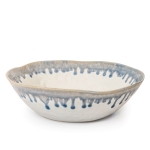 Burlington Pasta Bowl, Pool Simon Pearce has channeled the earthy spirit of Burlington with a collection of freehand pinch-pot designs. Each piece is alive with mottled, tactile uniqueness – including this versatile wide-rimmed bowl. The organic drip technique of their Pool glaze nods to modern art with a deep blue hue emanating from the edges. These truly one-of-a-kind pieces add a pop of color to existing Burlington pottery, or make a bold statement on their own.